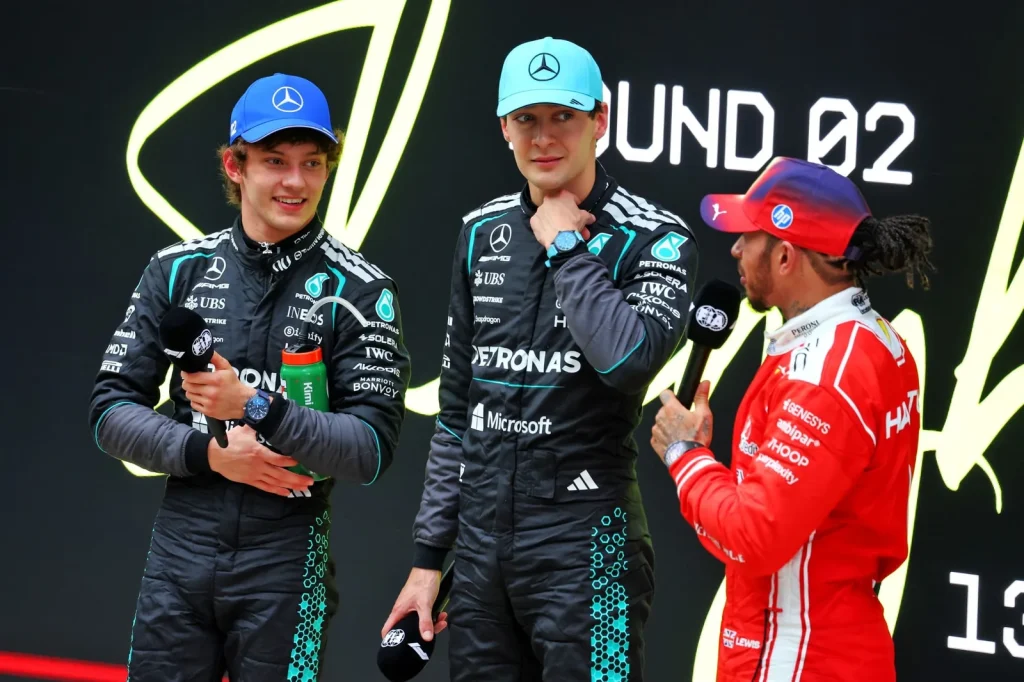 (L to R): race winner Andrea Kimi Antonelli (ITA) Mercedes AMG Formula One Team; second placed George Russell (GBR) Mercedes AMG Formula One Team; and third placed Lewis Hamilton (GBR) Scuderia Ferrari in parc ferme.