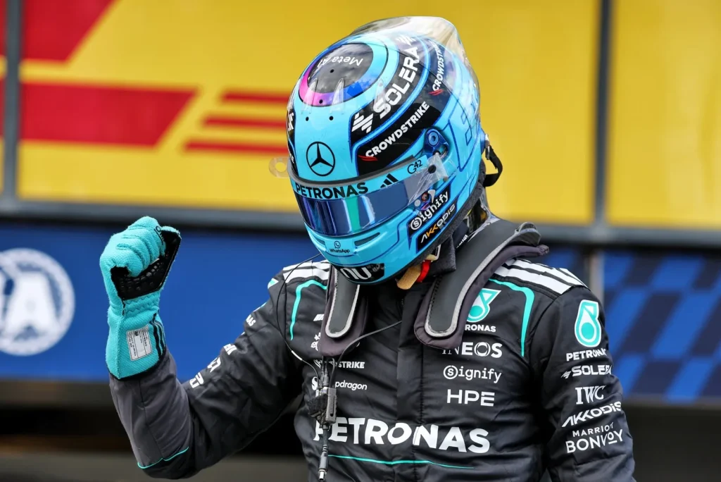 George Russell (GBR) Mercedes AMG Formula One Team celebrates his pole position in qualifying parc ferme.