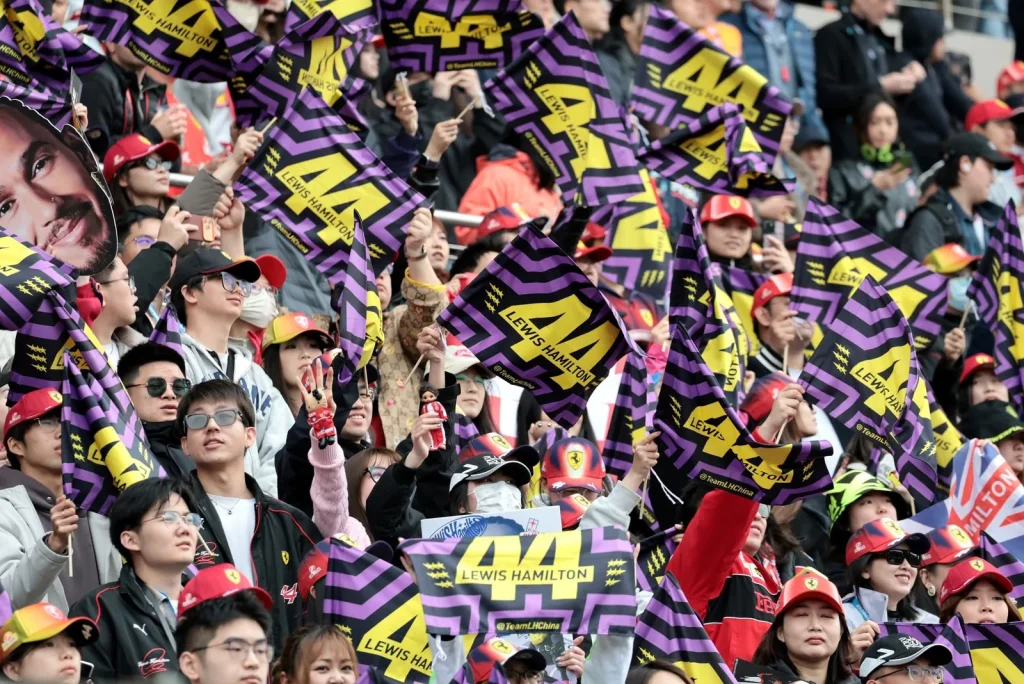 Circuit atmosphere - Lewis Hamilton (GBR) Scuderia Ferrari fans in the grandstand.
