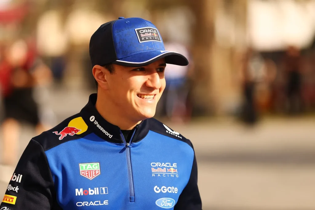 BAHRAIN, BAHRAIN - FEBRUARY 11: Isack Hadjar of France and Oracle Red Bull Racing arrives in the Paddock during day one of F1 Testing at Bahrain International Circuit on February 11, 2026 in Bahrain, Bahrain. (Photo by Zak Mauger/LAT Images) // Getty Images / Red Bull Content Pool // SI202602114867 // Usage for editorial use only //