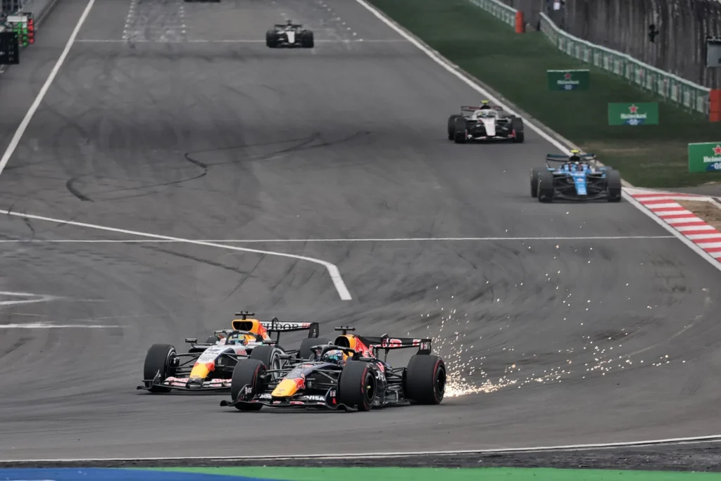 Arvid Lindblad (GBR) Racing Bulls Formula One Team VCARB 03 and Max Verstappen (NLD) Red Bull Racing RB22 battle for position.