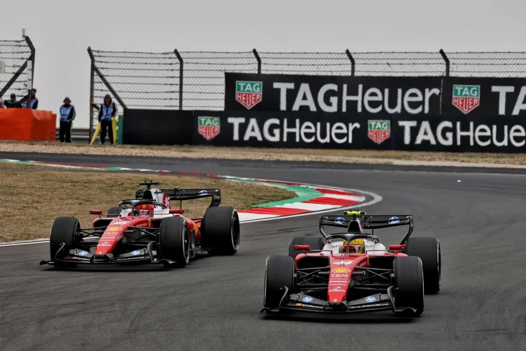 Charles Leclerc (MON) Scuderia Ferrari SF-26 and Lewis Hamilton (GBR) Scuderia Ferrari SF-26 battle for position.