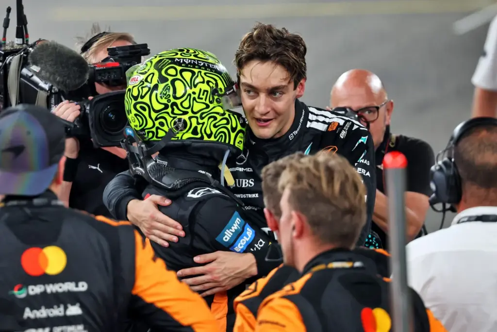 (L to R): Third placed World Champion Lando Norris (GBR) McLaren celebrates with George Russell (GBR) Mercedes AMG F1 in parc ferme.