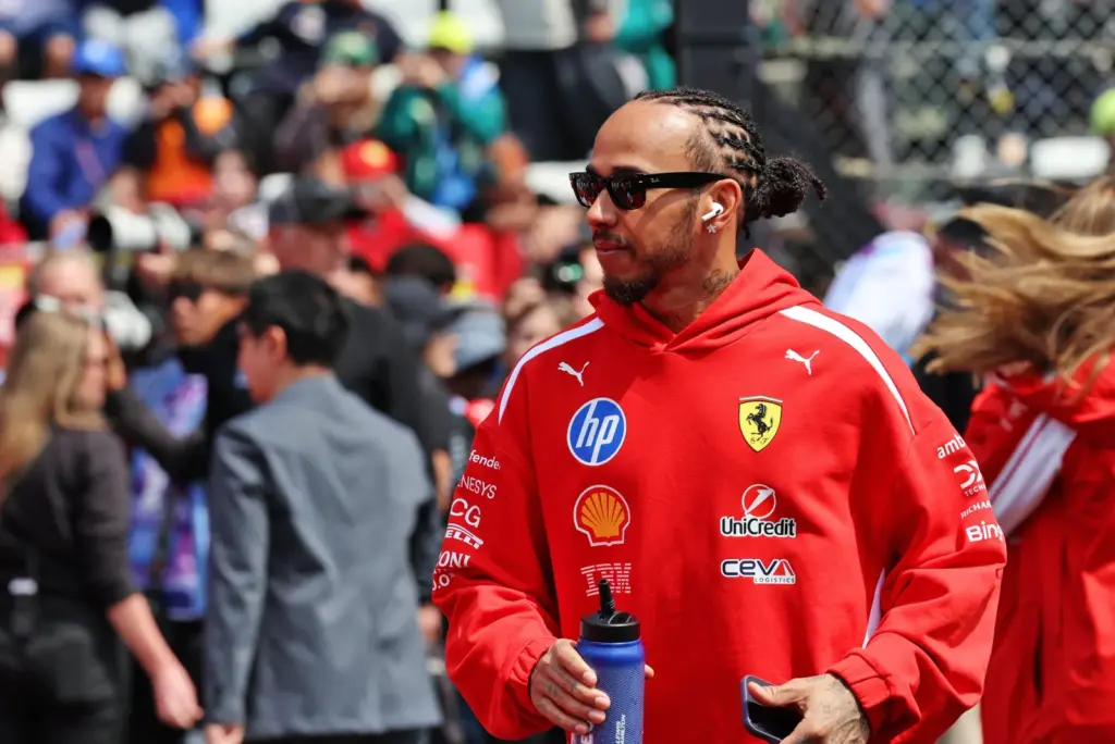 Lewis Hamilton (GBR) Scuderia Ferrari on the drivers' parade.