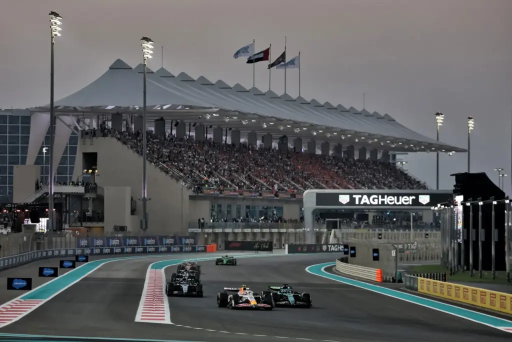 Liam Lawson (NZL) Racing Bulls VCARB 02 and George Russell (GBR) Mercedes AMG F1 W16 battle for position.
