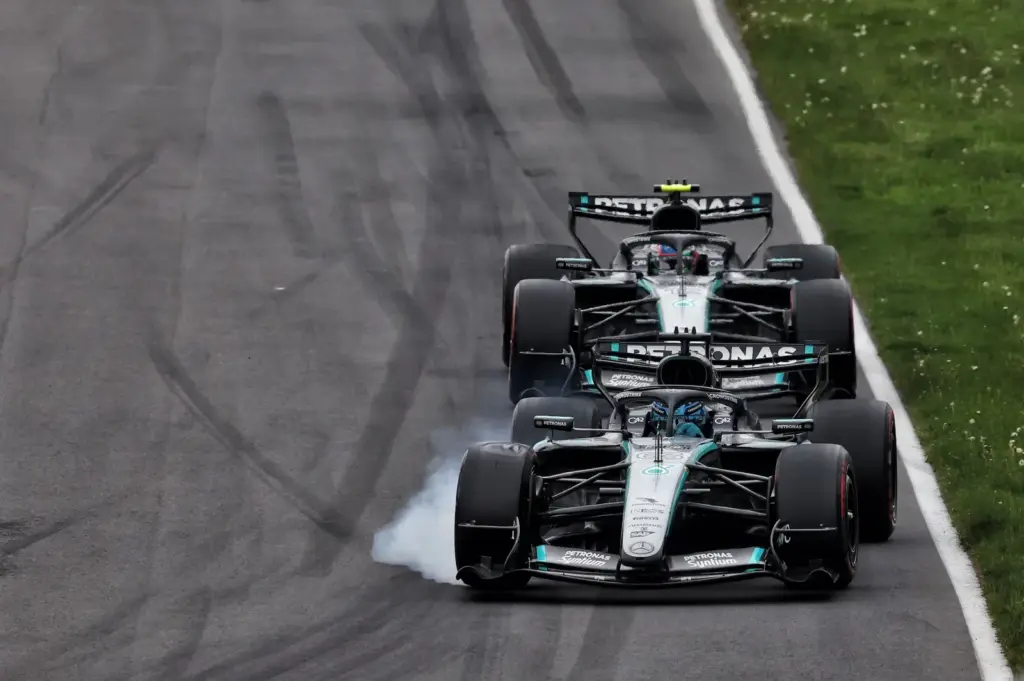 George Russell (GBR) Mercedes AMG Formula One Team W17 locks up under braking ahead of Andrea Kimi Antonelli (ITA) Mercedes AMG Formula One Team W17.