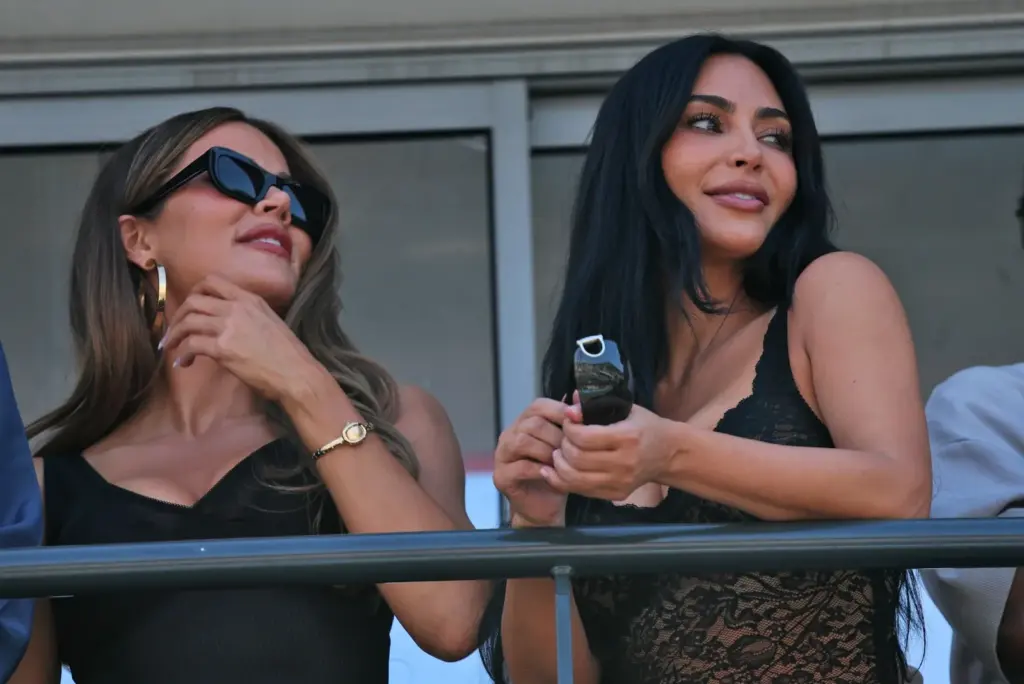 (L to R): Khloe Kardashian (USA) with Kim Kardashian (USA).
