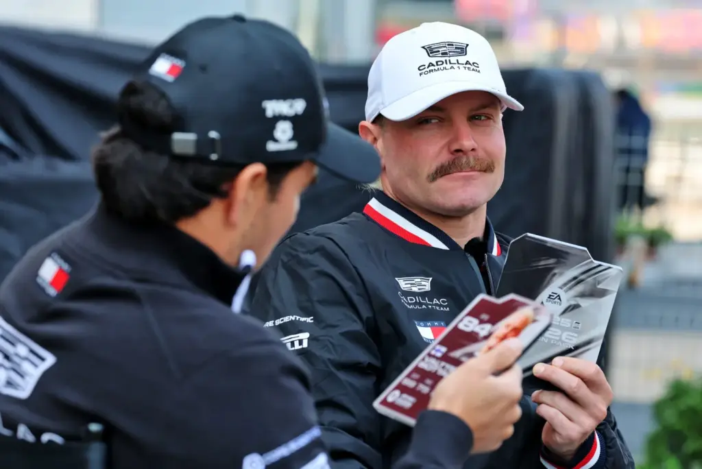Valtteri Bottas (FIN) Cadillac Formula 1 Team with team mate Sergio Perez (MEX) Cadillac Formula 1 Team.