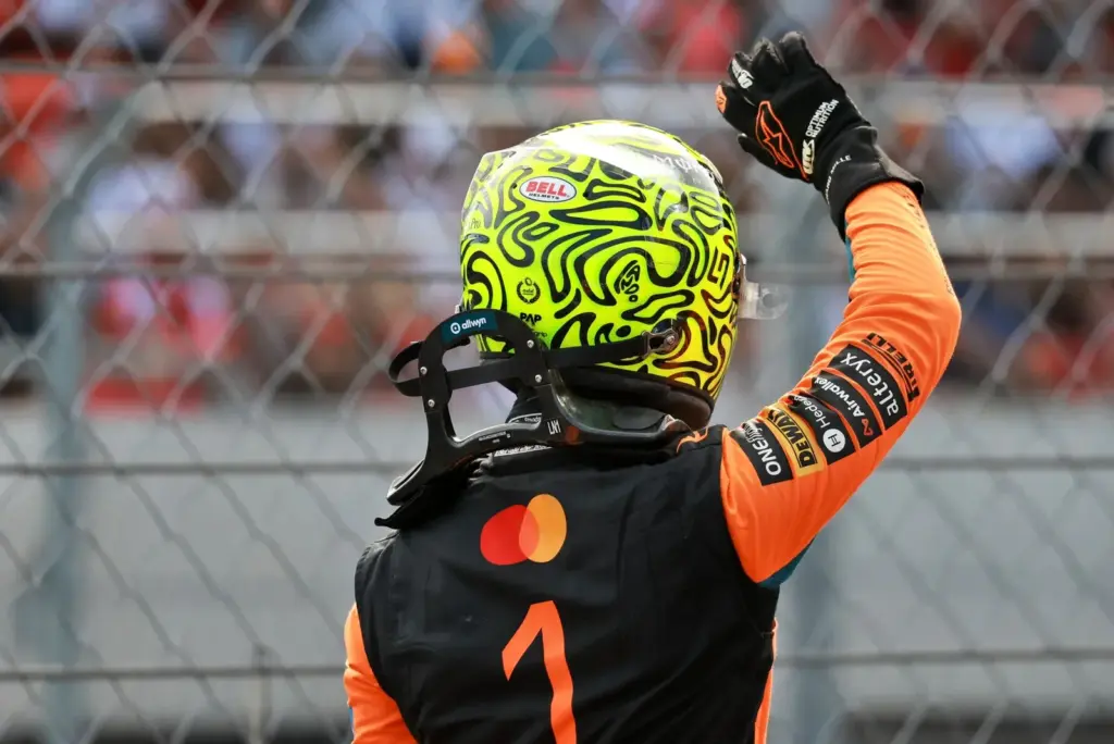 Lando Norris (GBR) McLaren F1 Team celebrates his pole position in qualifying parc ferme.