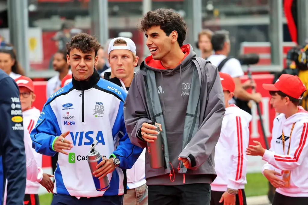 (L to R): Isack Hadjar (FRA) Red Bull Racing and Gabriel Bortoleto (BRA) Audi F1 Team on the drivers' parade.