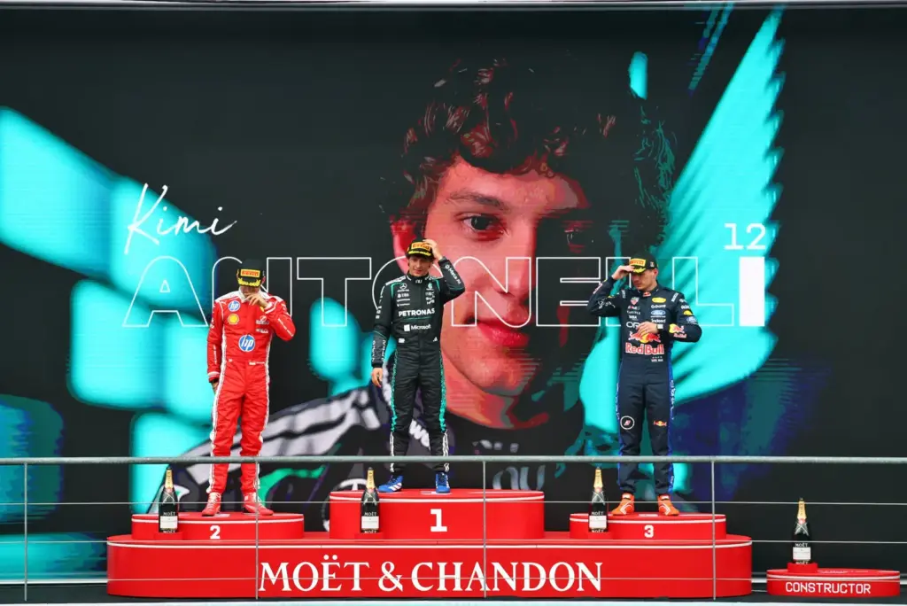 The podium (L to R): Charles Leclerc (MON) Scuderia Ferrari, second; Andrea Kimi Antonelli (ITA) Mercedes AMG Formula One Team, race winner; Max Verstappen (NLD) Red Bull Racing, third.
