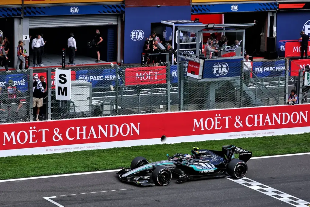 Race winner Andrea Kimi Antonelli (ITA) Mercedes AMG Formula One Team W17 takes the chequered flag at the end of the race.