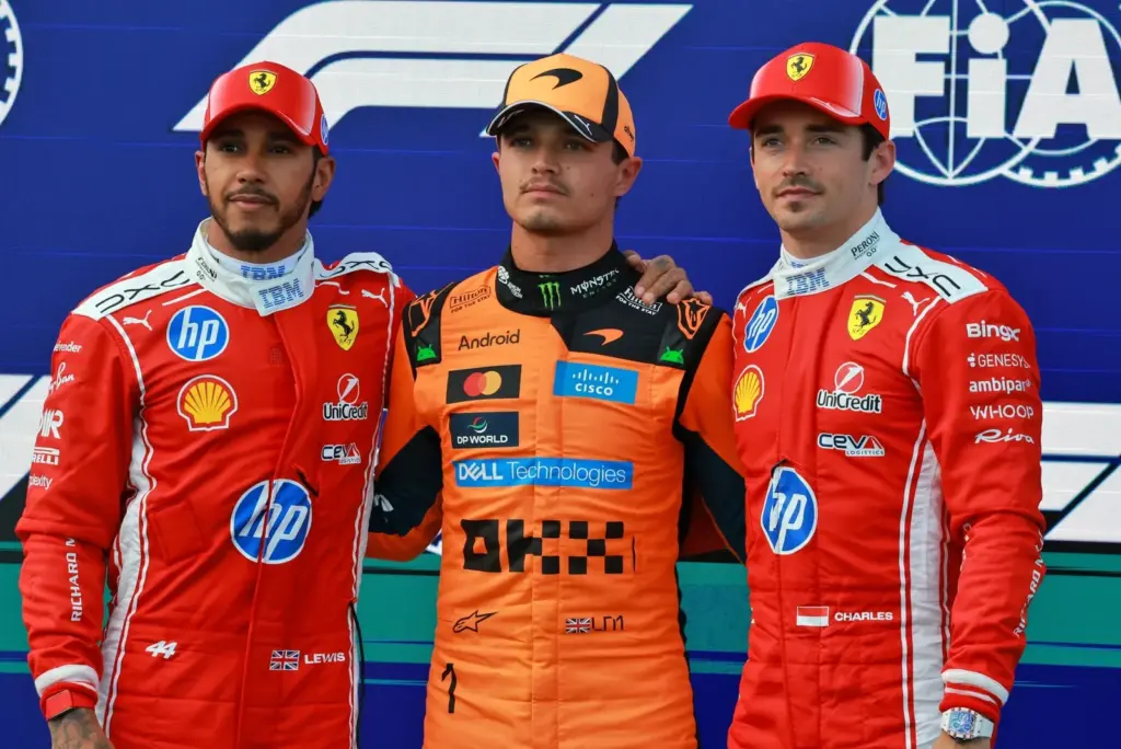 The top three in qualifying parc ferme (L to R): Lewis Hamilton (GBR) Scuderia Ferrari, second; Lando Norris (GBR) McLaren F1 Team; pole position; Charles Leclerc (MON) Scuderia Ferrari, third.