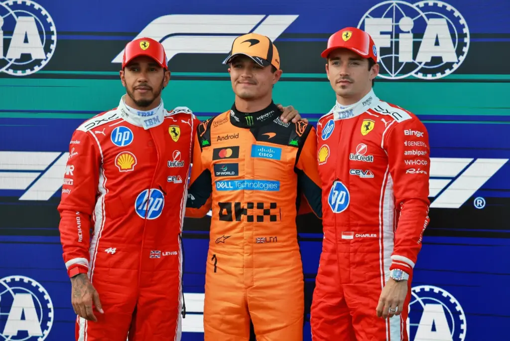 The top three in qualifying parc ferme (L to R): Lewis Hamilton (GBR) Scuderia Ferrari, second; Lando Norris (GBR) McLaren F1 Team; pole position; Charles Leclerc (MON) Scuderia Ferrari, third.