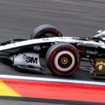 F1: Budowski states what is the "first priority" after taking command of Cadillac