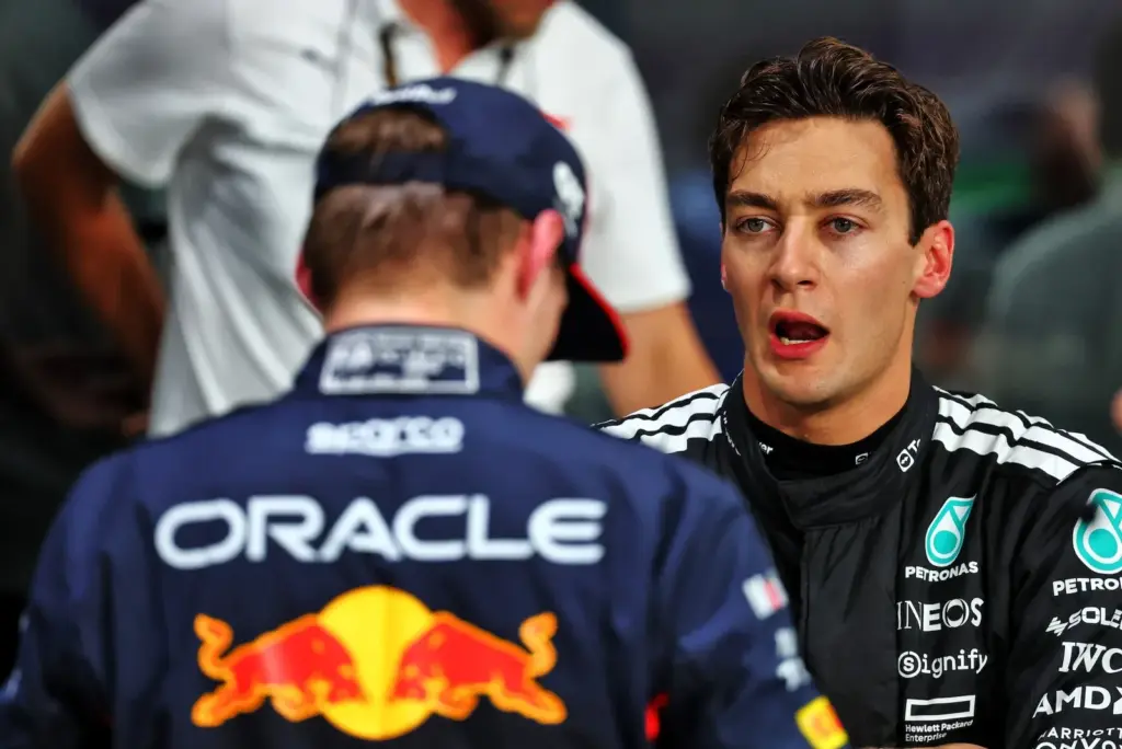 George Russell (GBR) Mercedes AMG F1 in qualifying parc ferme with Max Verstappen (NLD) Red Bull Racing