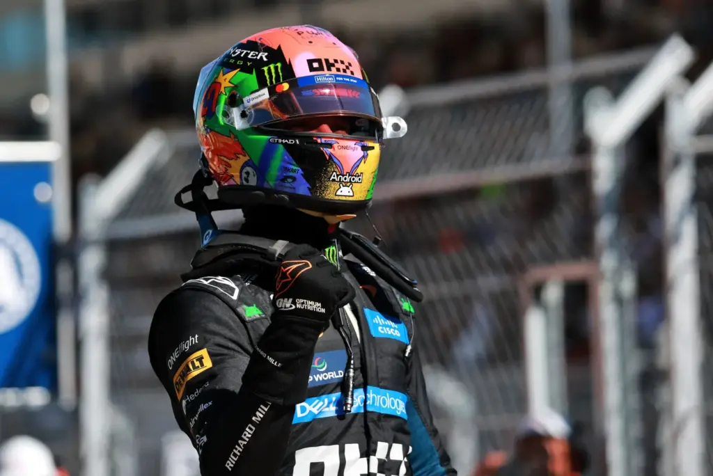 Lando Norris (GBR) McLaren F1 Team celebrates his pole position in qualifying parc ferme.