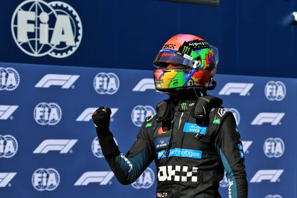 Lando Norris (GBR) McLaren F1 Team celebrates his pole position in qualifying parc ferme.
