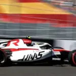 F1: Bearman leaves the pit lane after changes to the Haas car