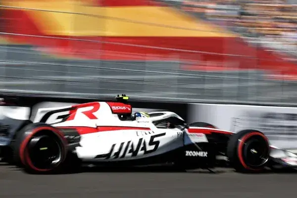 F1: Bearman leaves the pit lane after changes to the Haas car