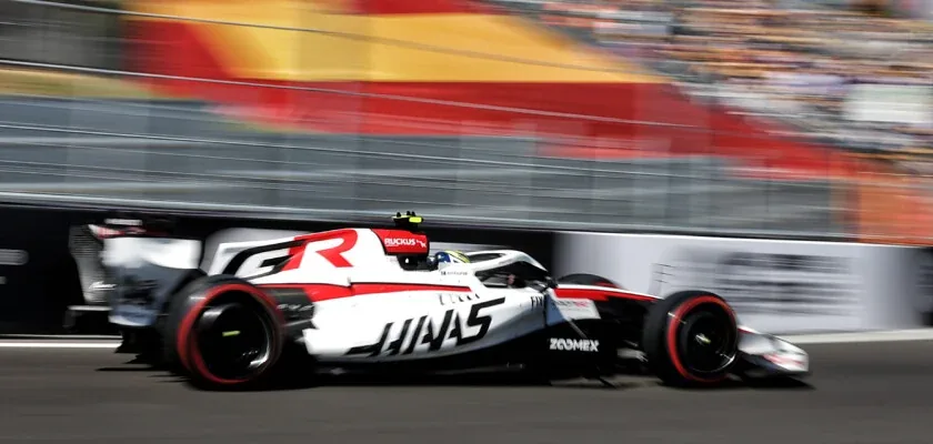 F1: Bearman leaves the pit lane after changes to the Haas car