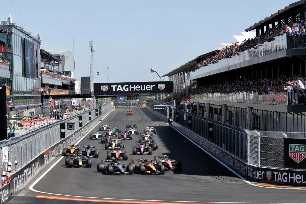 Lando Norris (GBR) McLaren F1 Team MCL40 leads Andrea Kimi Antonelli (ITA) Mercedes AMG Formula One Team W17 and Lewis Hamilton (GBR) Scuderia Ferrari SF-26 at the start of the race.