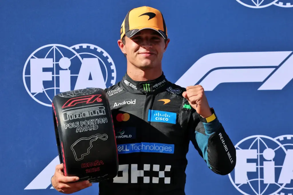Lando Norris (GBR) McLaren F1 Team celebrates with the Pirelli Pole Position Award in qualifying parc ferme.